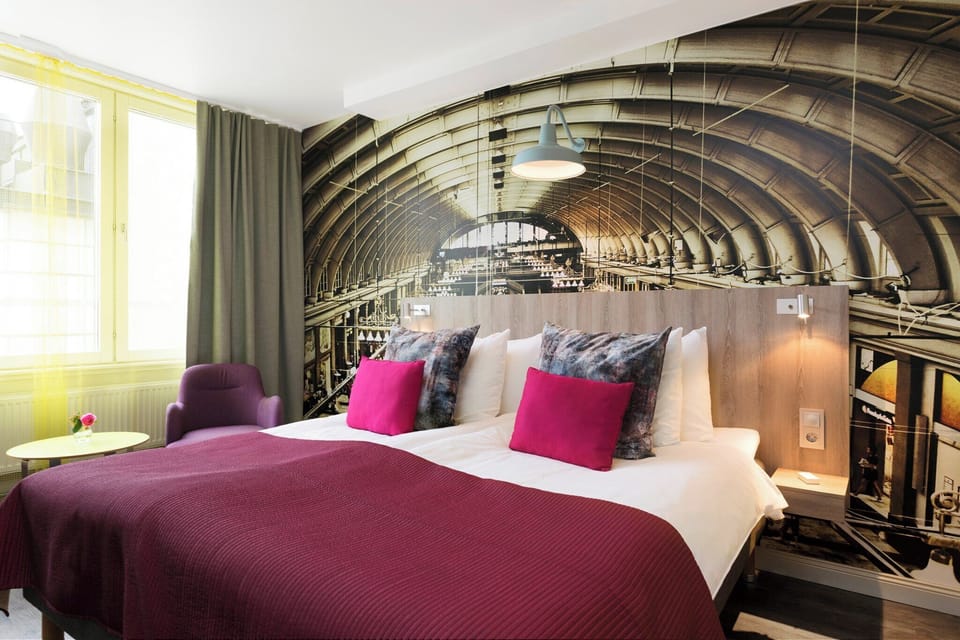 Superior King Room | Premium bedding, pillowtop beds, blackout drapes, free cribs/infant beds