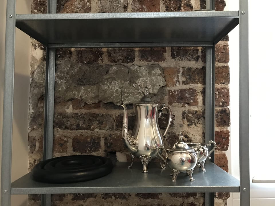A beautiful white metal set for serving coffe, tea or hot chocolate