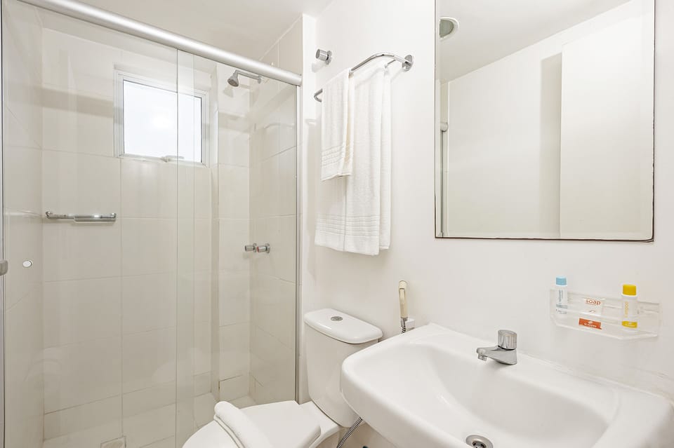 Shower, rainfall showerhead, towels