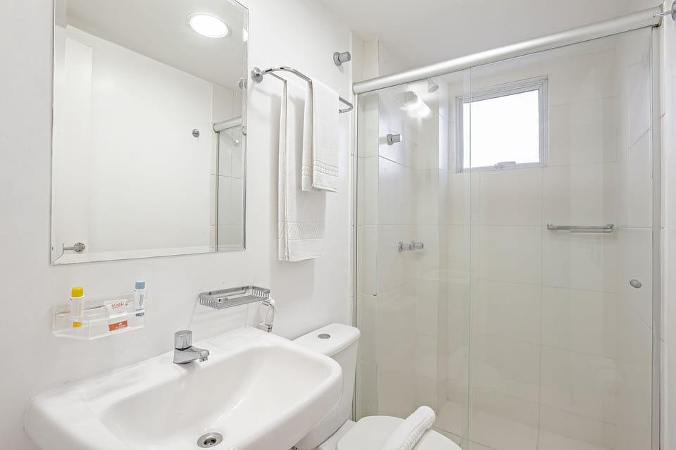 Shower, rainfall showerhead, towels
