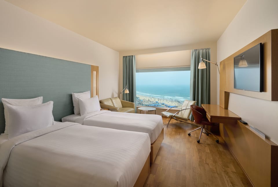 Premium bedding, down comforters, minibar, in-room safe
