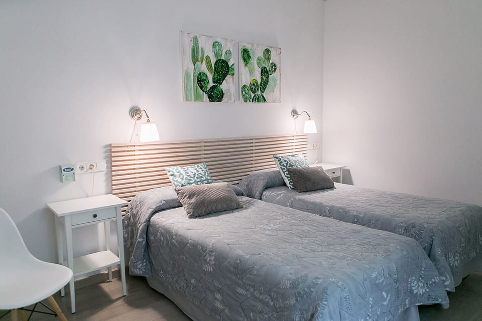 Double Room, Shared Bathroom (Interior - 2 Beds) | In-room safe, iron/ironing board (on request), WiFi (free), bed sheets