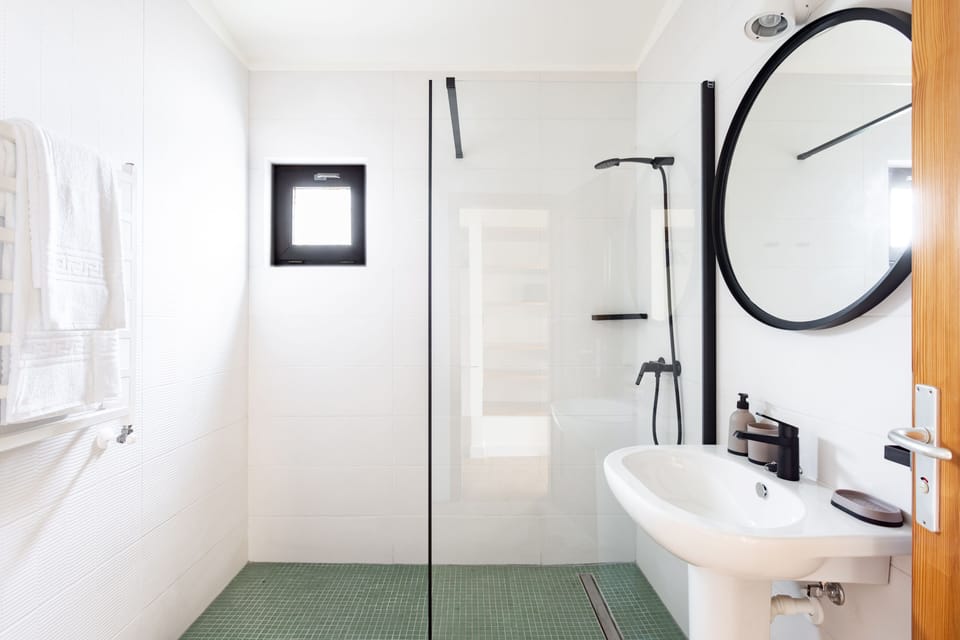 Double Room, Ocean View | Bathroom | Shower, hair dryer, towels, soap