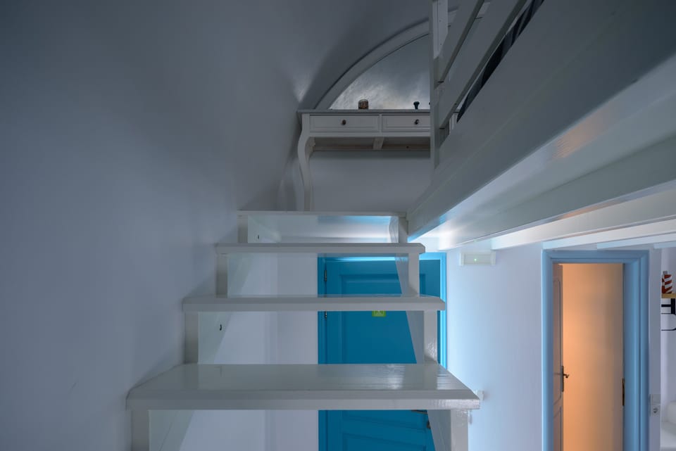 Comfort Suite with Caldera View | Minibar, in-room safe, soundproofing, iron/ironing board