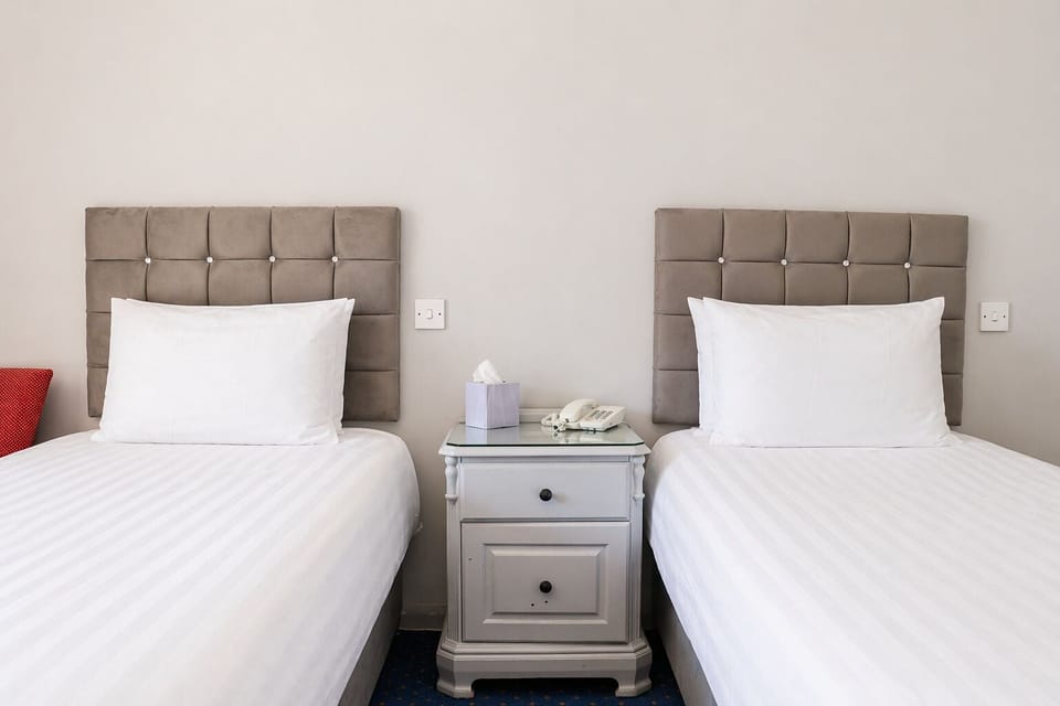 Twin Room, 2 Twin Beds | Desk, iron/ironing board, free WiFi, bed sheets