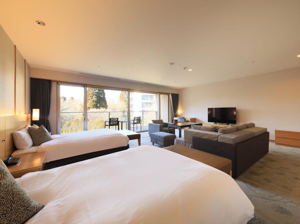 Western-style wide deluxe room with indoor hot spring(3 persons max.), Non Smoking | Free minibar, in-room safe, iron/ironing board, free WiFi