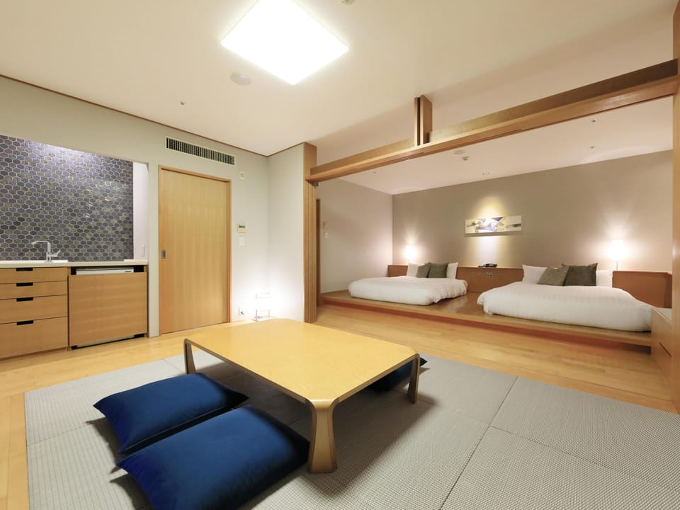 Japanese-Western style room with indoor hot spring bath (5 persons capacity), Non Smoking | Free minibar, in-room safe, iron/ironing board, free WiFi