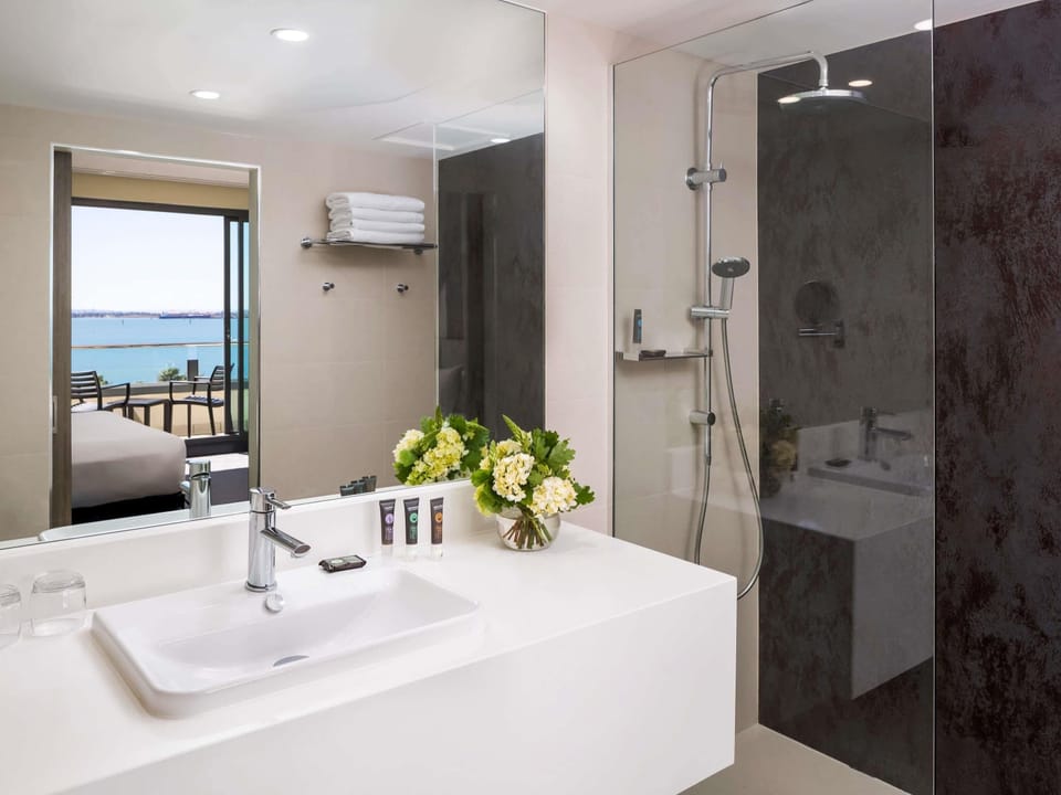 Shower, rainfall showerhead, eco-friendly toiletries, hair dryer