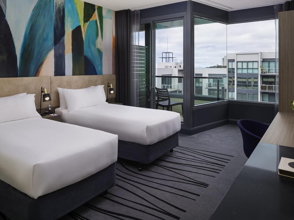 Twin Room, Accessible | Minibar, in-room safe, desk, laptop workspace