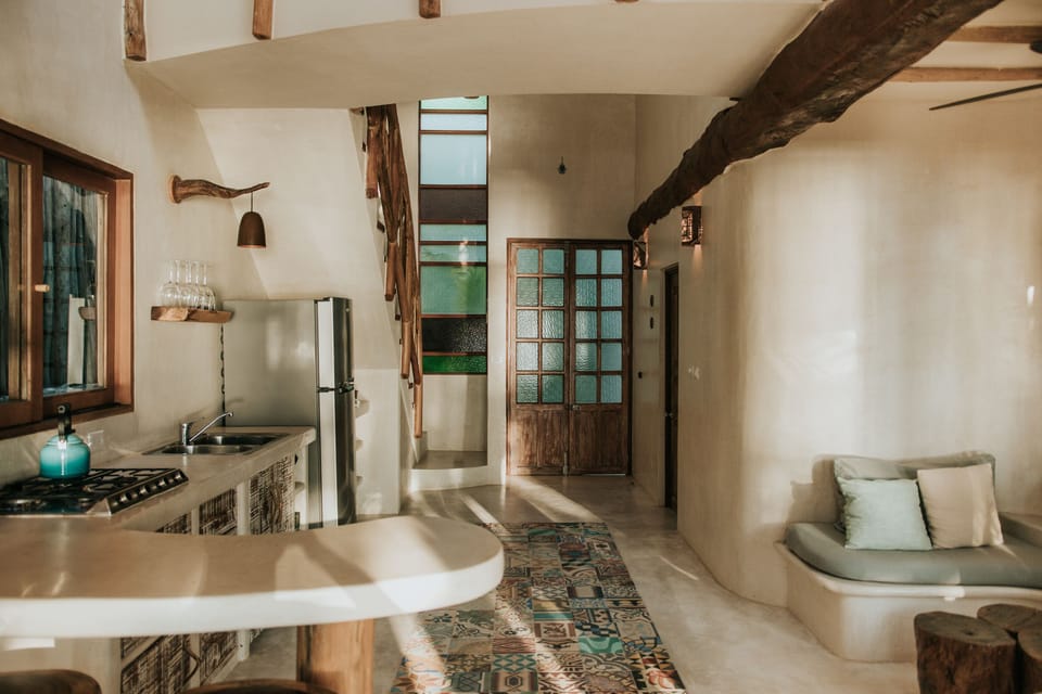 Villa | Private kitchen | Full-size fridge, stovetop, coffee/tea maker, highchair