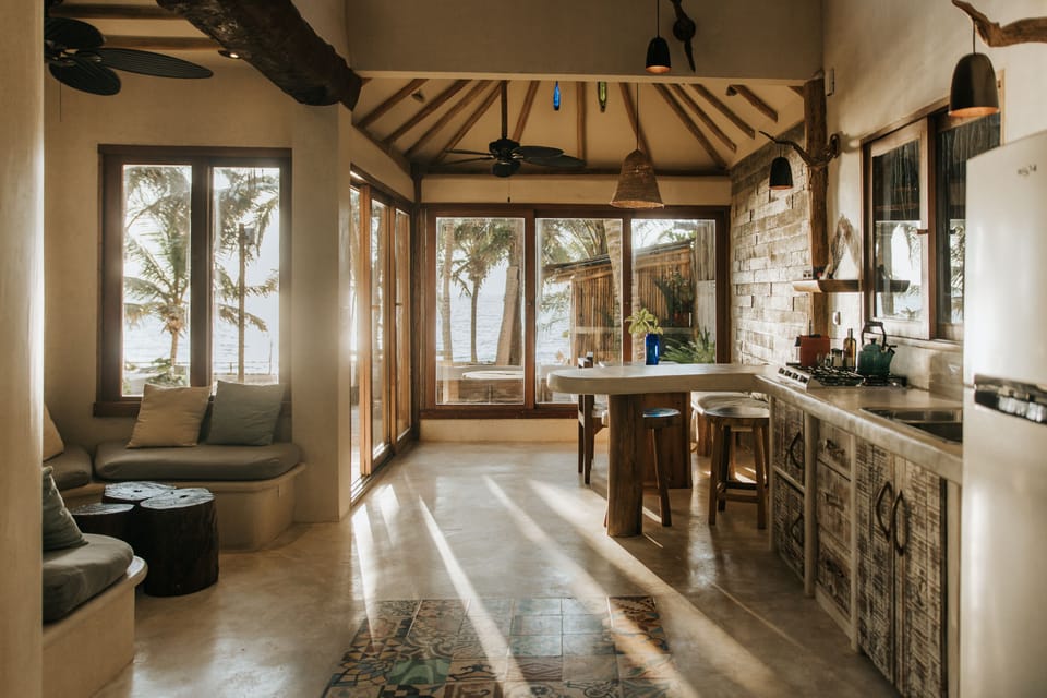 Villa | Private kitchen | Full-size fridge, stovetop, coffee/tea maker, highchair