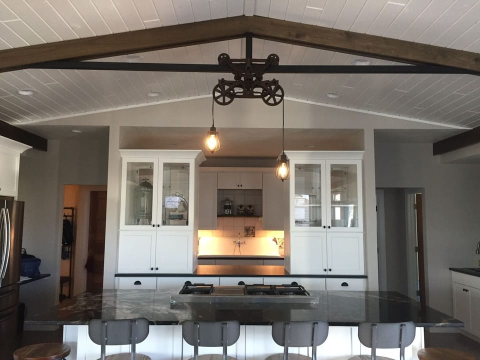 Breakfast bar seats 6 w/ professional 6 burner stove.