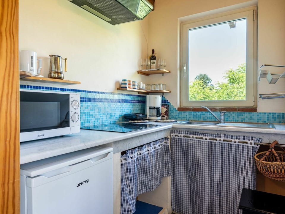 Countertop, Kitchen Sink, Cabinetry, Property, Sink, Tap, Blue, Kitchen, Window, Azure