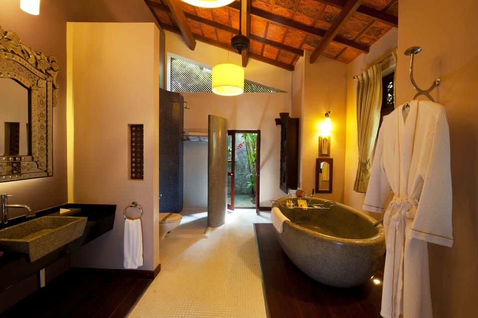 Separate tub and shower, deep soaking tub, designer toiletries