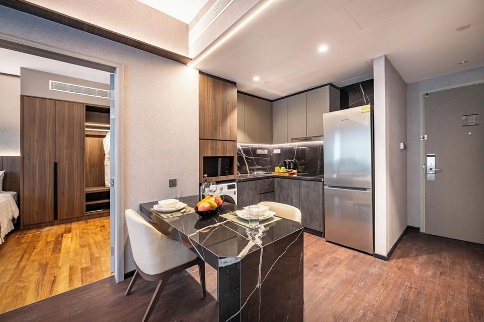 Two Bedroom Suite | Minibar, in-room safe, desk, laptop workspace