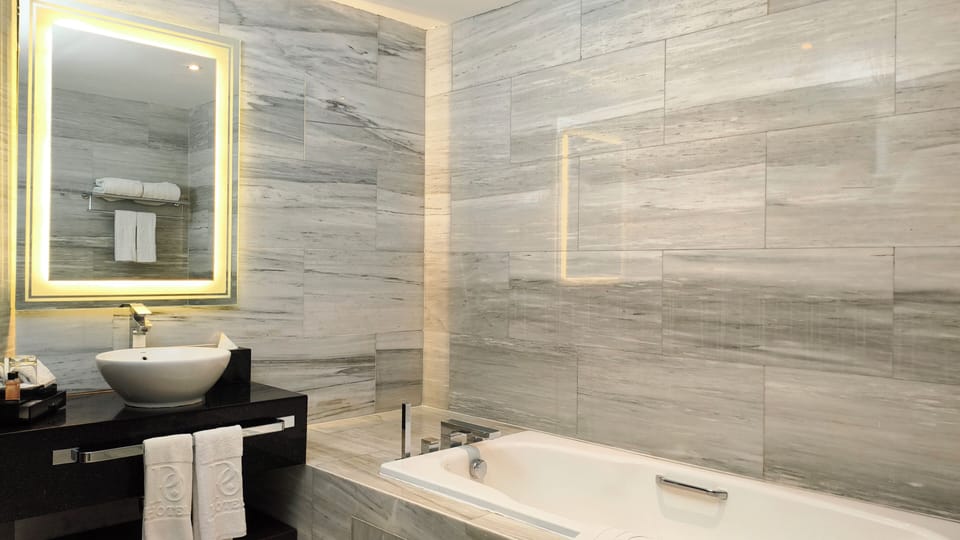 Suite | Bathroom | Separate tub and shower, deep soaking tub, rainfall showerhead
