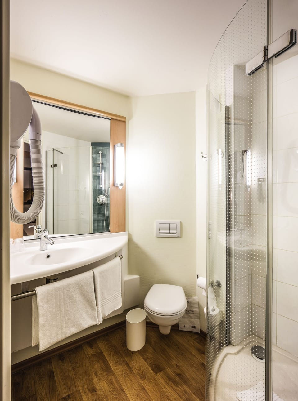 Shower, eco-friendly toiletries, hair dryer, towels
