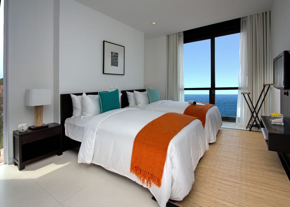 Premium bedding, down comforters, pillowtop beds, minibar