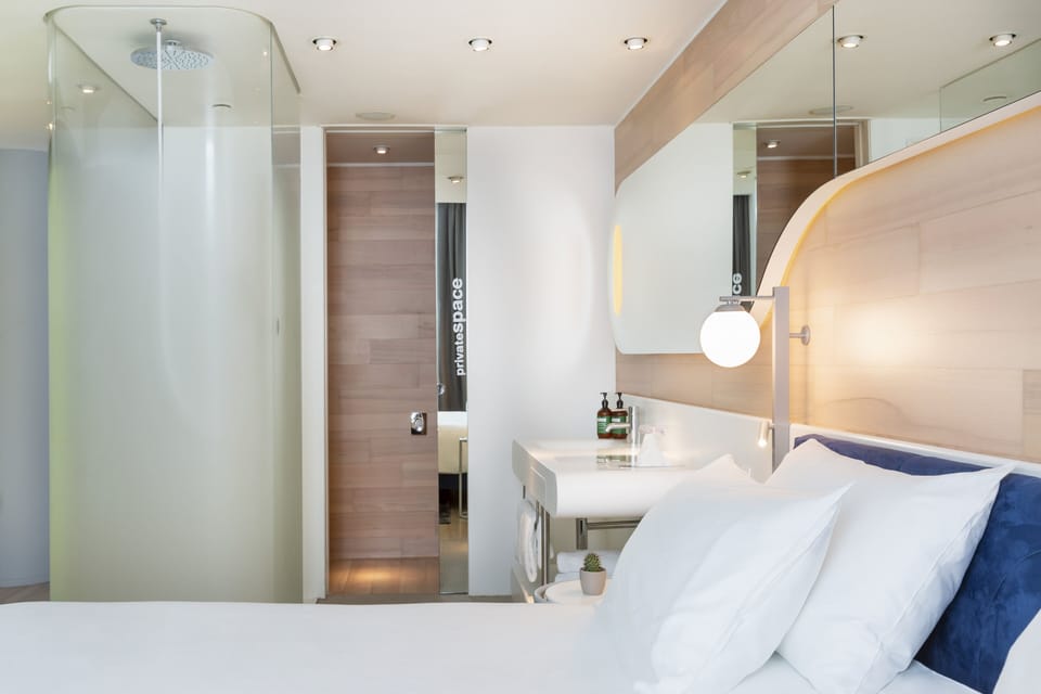 Premium bedding, down comforters, minibar, in-room safe