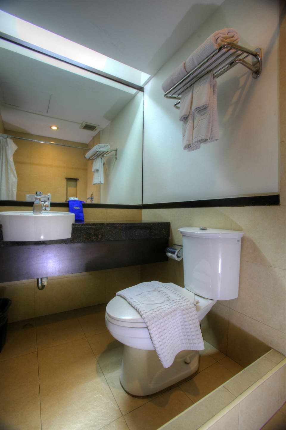 Shower, free toiletries, slippers, towels