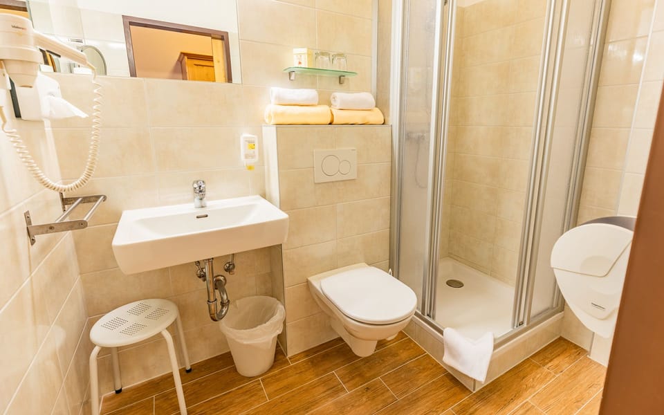 Shower, free toiletries, hair dryer, towels