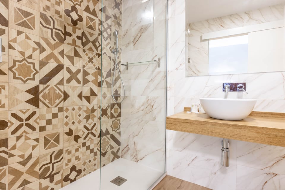Shower, deep soaking tub, free toiletries, hair dryer