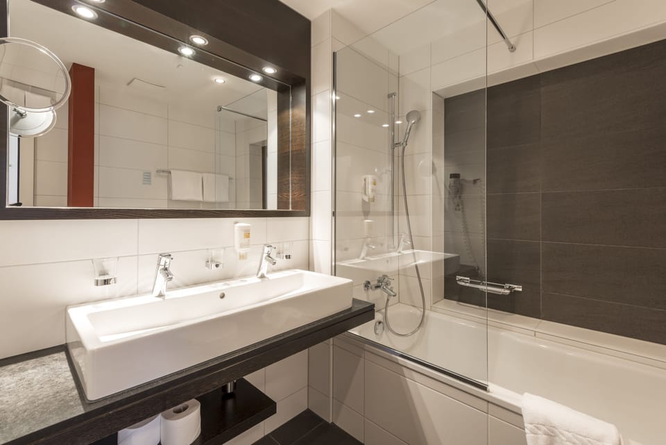 Quadruple Room | Bathroom | Shower, hair dryer, towels