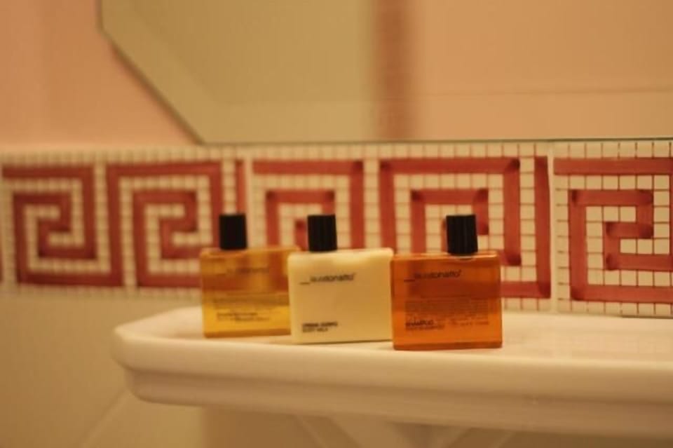 Jetted tub, hydromassage showerhead, designer toiletries, hair dryer