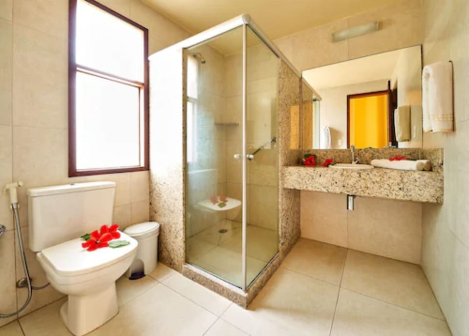 Shower, rainfall showerhead, free toiletries, hair dryer