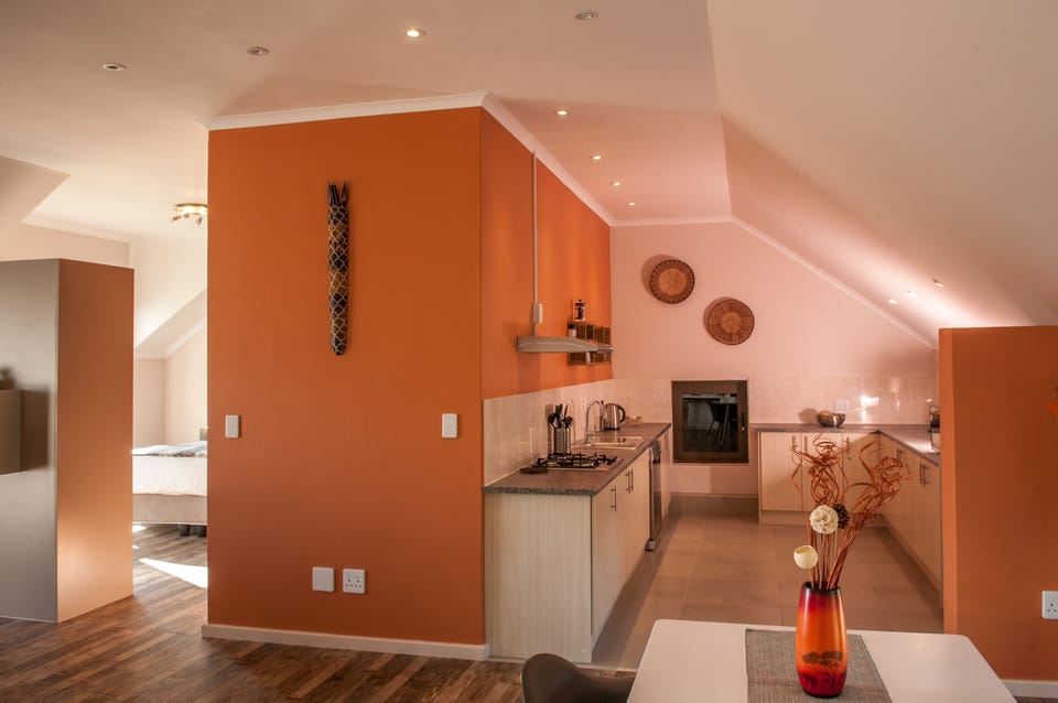 Luxury Suite | Private kitchen | Fridge, microwave, electric kettle