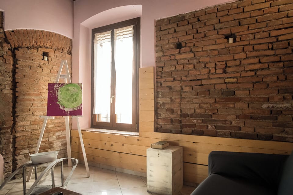 Deluxe Apartment, Kitchen | Living area | 24-inch flat-screen TV with digital channels