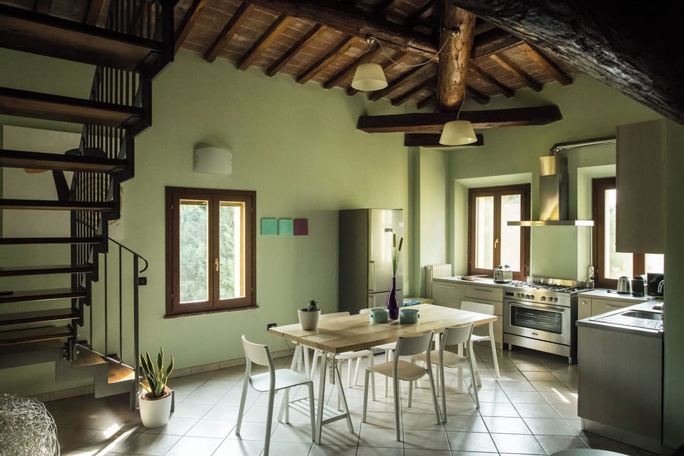 Deluxe Apartment, Kitchen | Private kitchen | Espresso maker, coffee/tea maker, electric kettle
