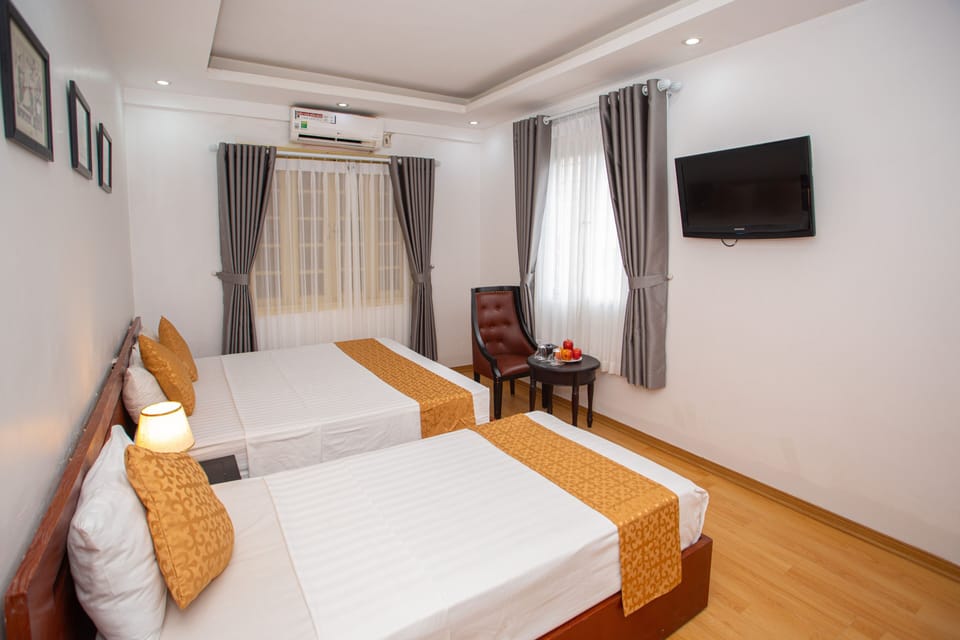 Family Room, Smoking, City View | Minibar, in-room safe, desk, laptop workspace