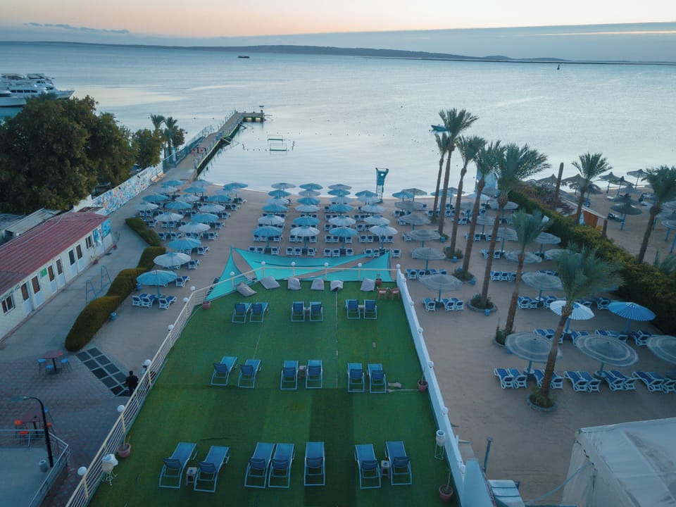 Private beach, sun loungers, beach umbrellas, beach towels
