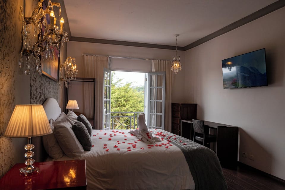Swiss Master Suite with Fireplace | Egyptian cotton sheets, premium bedding, down comforters, pillowtop beds