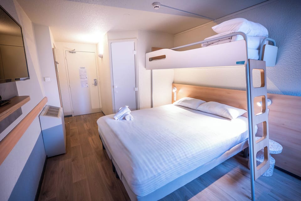 Triple Room, Multiple Beds | Hypo-allergenic bedding available, desk, blackout drapes