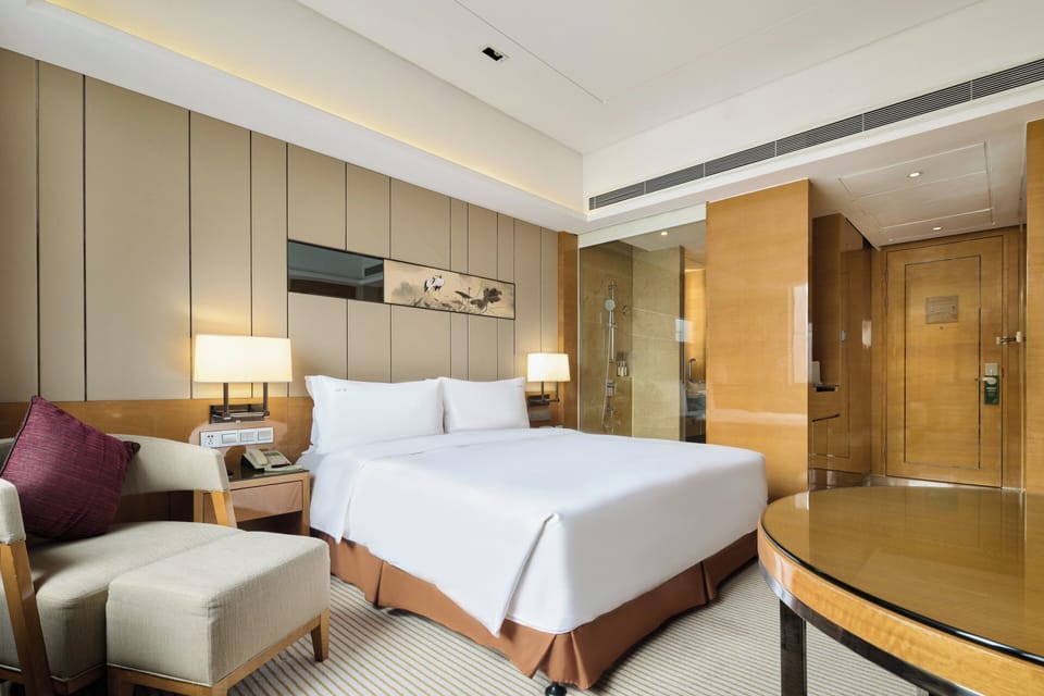 20 bedrooms, down comforters, in-room safe, desk