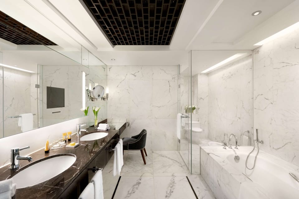 Combined shower/tub, hair dryer, bathrobes, slippers