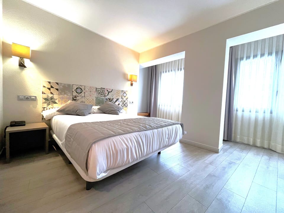 Deluxe Double Room | Down comforters, laptop workspace, blackout drapes, soundproofing