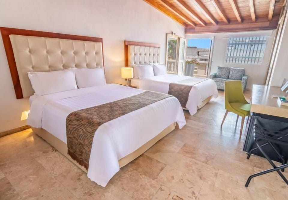 Premium bedding, down comforters, minibar, in-room safe