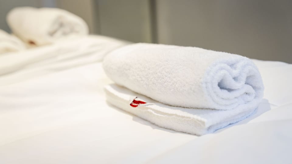 Economy Double Room, Shared Bathroom | Individually furnished, desk, laptop workspace, blackout drapes