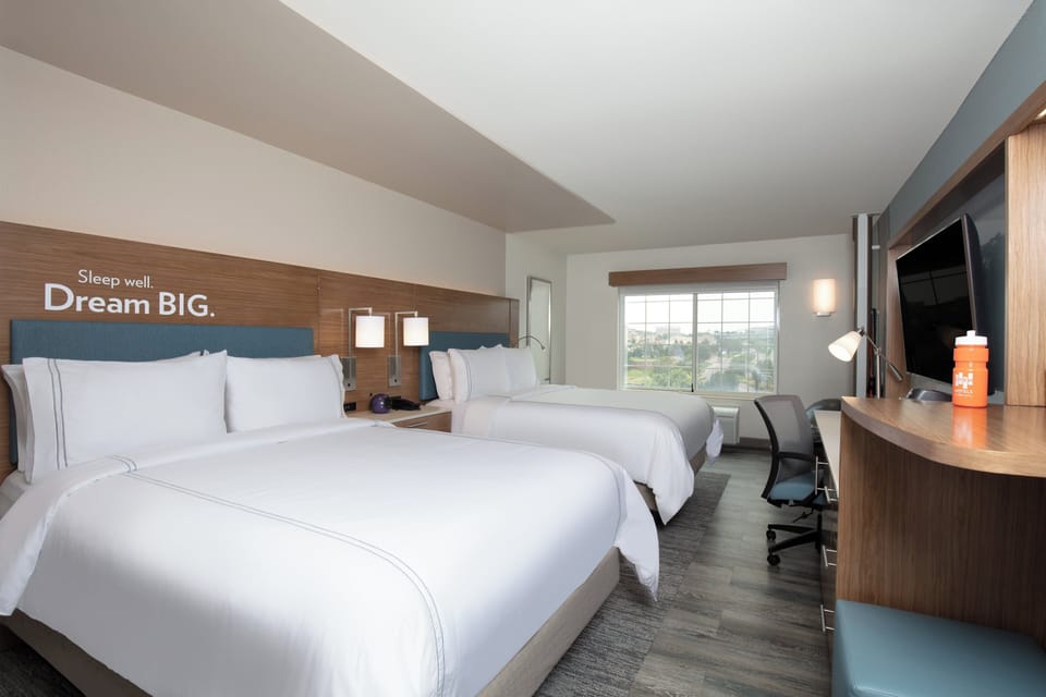 Premium bedding, down comforters, pillowtop beds, in-room safe