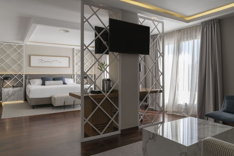Premium bedding, down comforters, memory foam beds, minibar