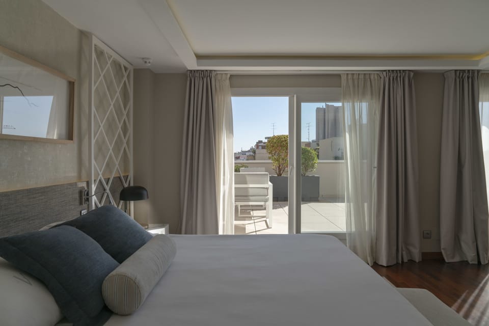 Premium bedding, down comforters, memory foam beds, minibar