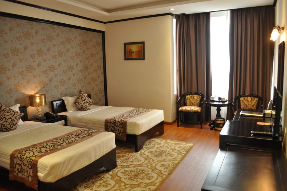 Deluxe Room | 2 bedrooms, minibar, in-room safe, desk