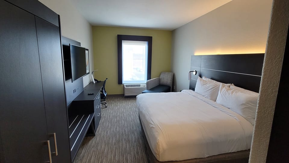 Desk, iron/ironing board, WiFi (free), alarm clocks