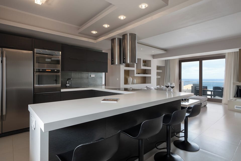 Elite Suite, Sea View | Private kitchen | Full-size fridge, microwave, stovetop, dishwasher