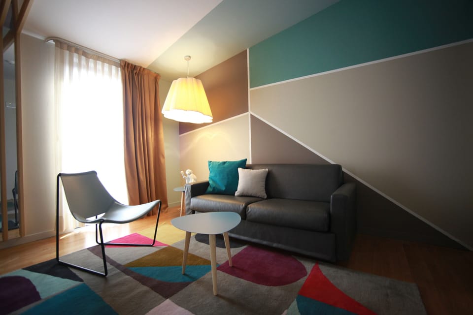 Family Triple Room | Premium bedding, minibar, in-room safe, individually decorated