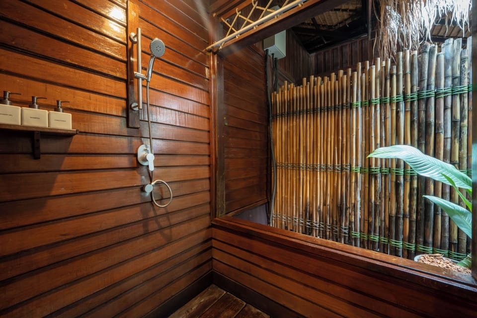 Shower, rainfall showerhead, designer toiletries, hair dryer