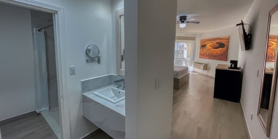 Standard Double Room, Partial Sea View | Laptop workspace, blackout drapes, iron/ironing board, free WiFi